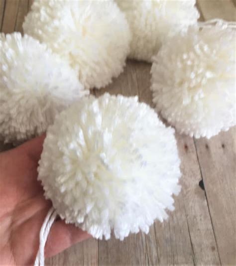 big white pom poms